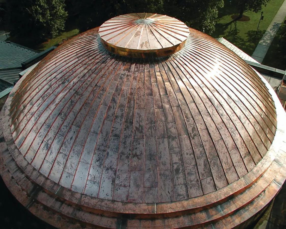 Craftsman Roofing crew installing a new roof in Harlem